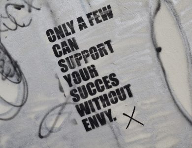 graffiti on the side of a wall that says only a few can support your success