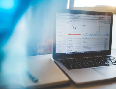 Laptop displaying Google Analytics in a modern workspace, highlighting digital analytics and technology.