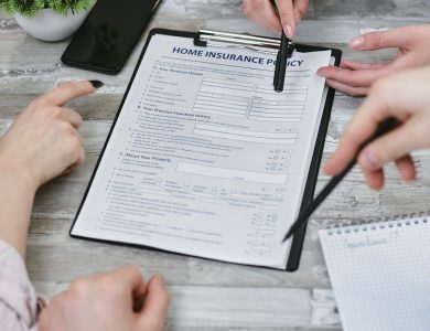 Three individuals collaborating on a home insurance policy document. Elements include a clipboard, notes, and pointing hands.