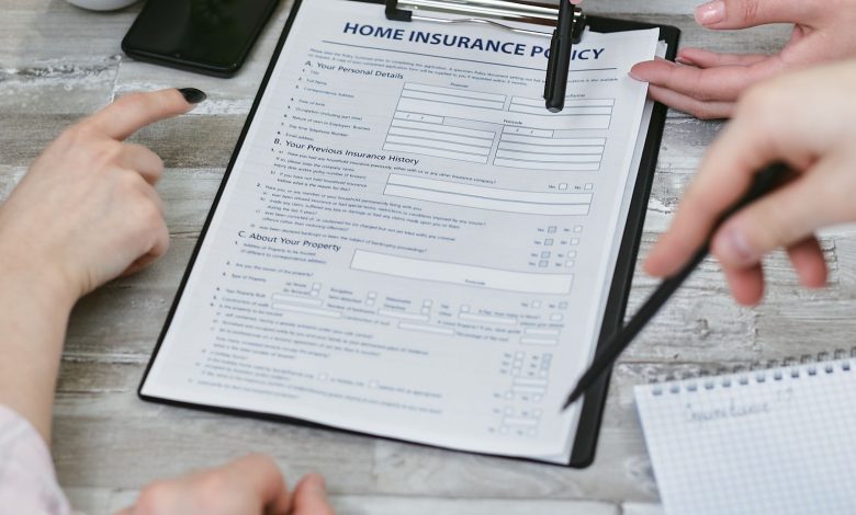 Three individuals collaborating on a home insurance policy document. Elements include a clipboard, notes, and pointing hands.