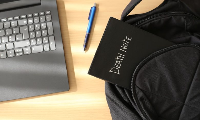 a bag and a laptop on a table